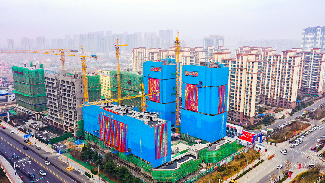 藍岸郡景產(chǎn)權型人才住房項目封頂(圖2)